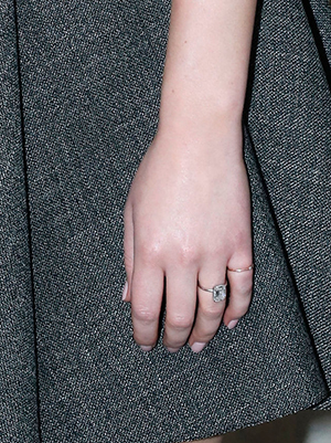 Closeup of Jennifer Lawrence's emerald cut diamond engagement ring 