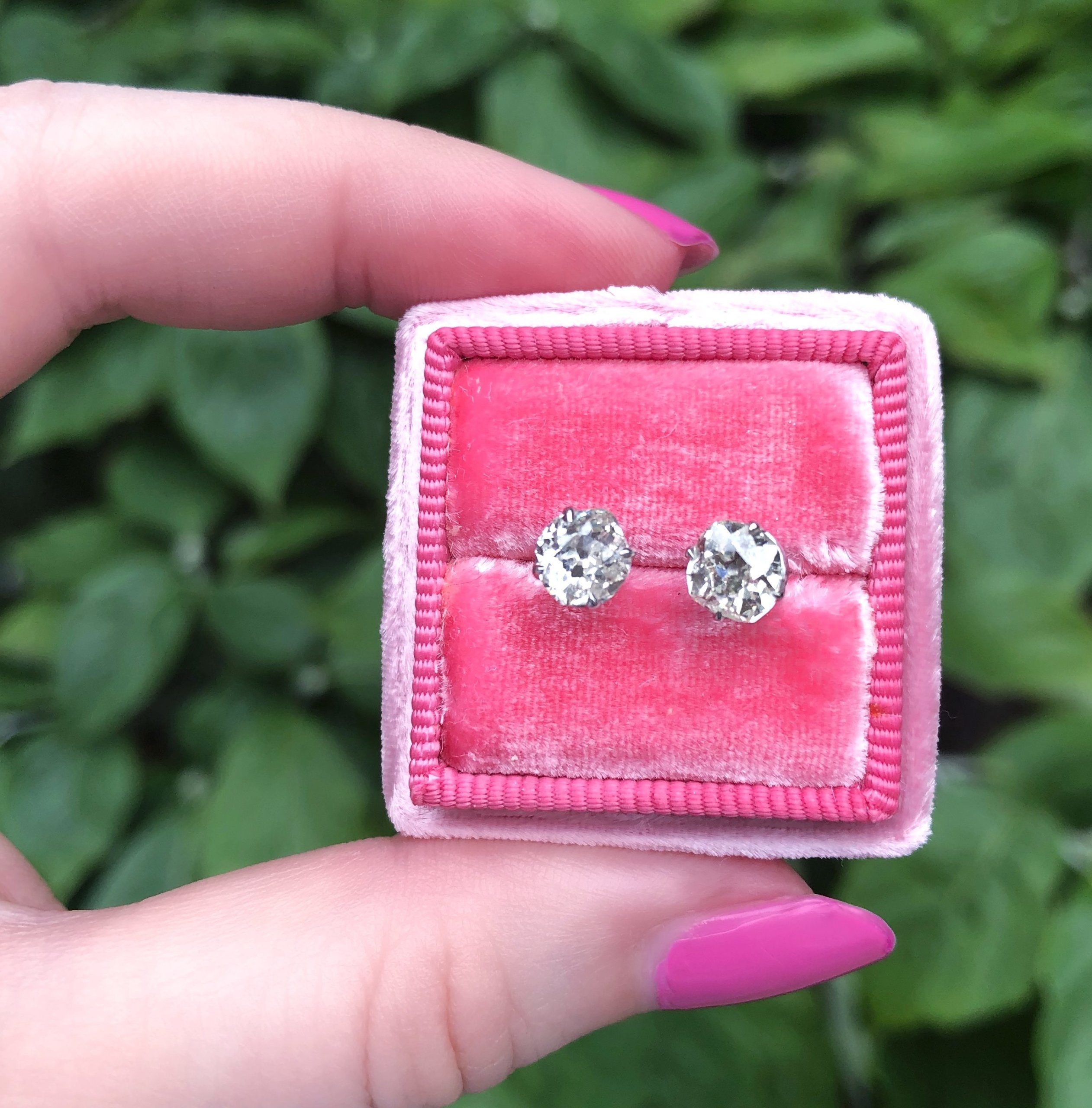 Asymmetrical old mine cut diamond stud earrings