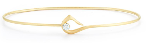 Gold bangle bracelet with a hook closure, accented with one round cut diamond
