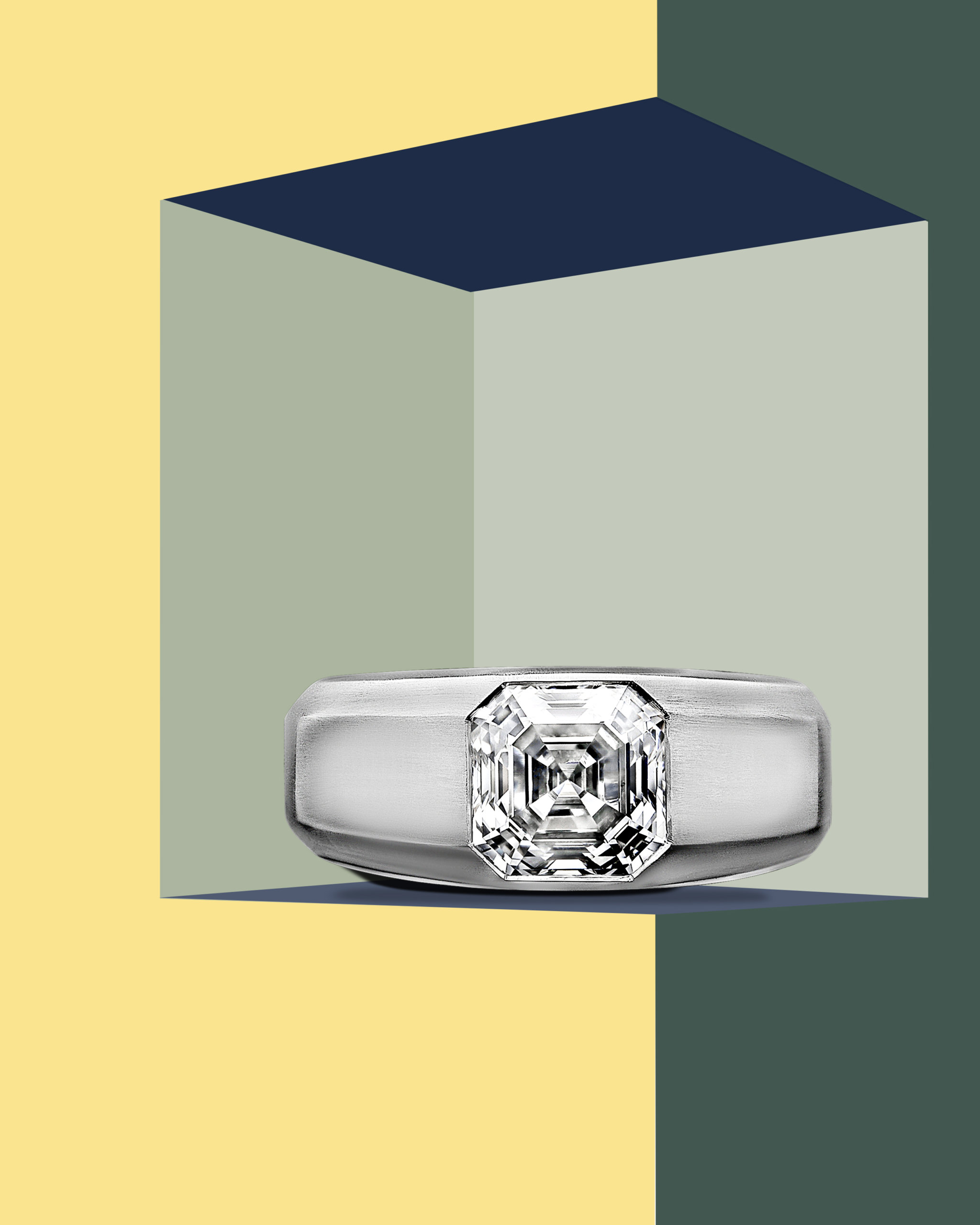 Beveled edge platinum gypsy set ring with a center Asscher cut diamond from Hancocks