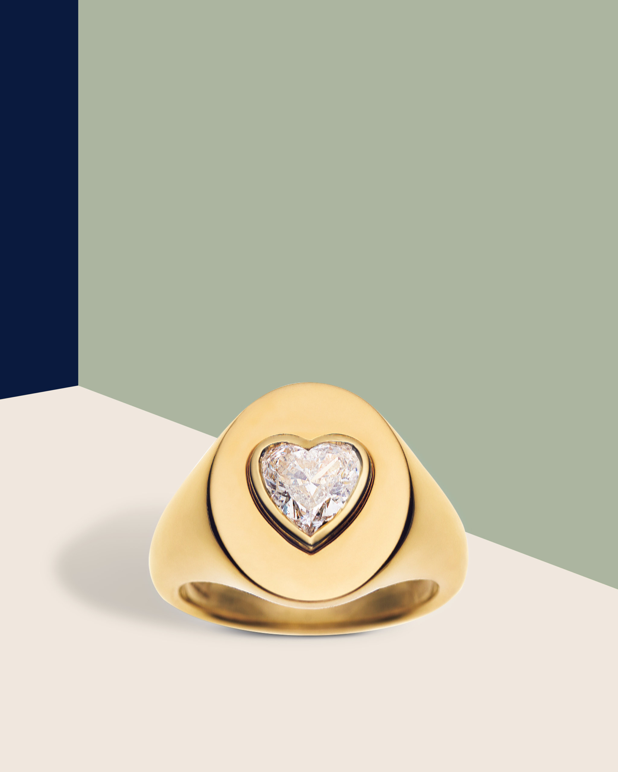 Gypsy set ring in yellow gold with a heart shaped diamond from Jemma Waynne
