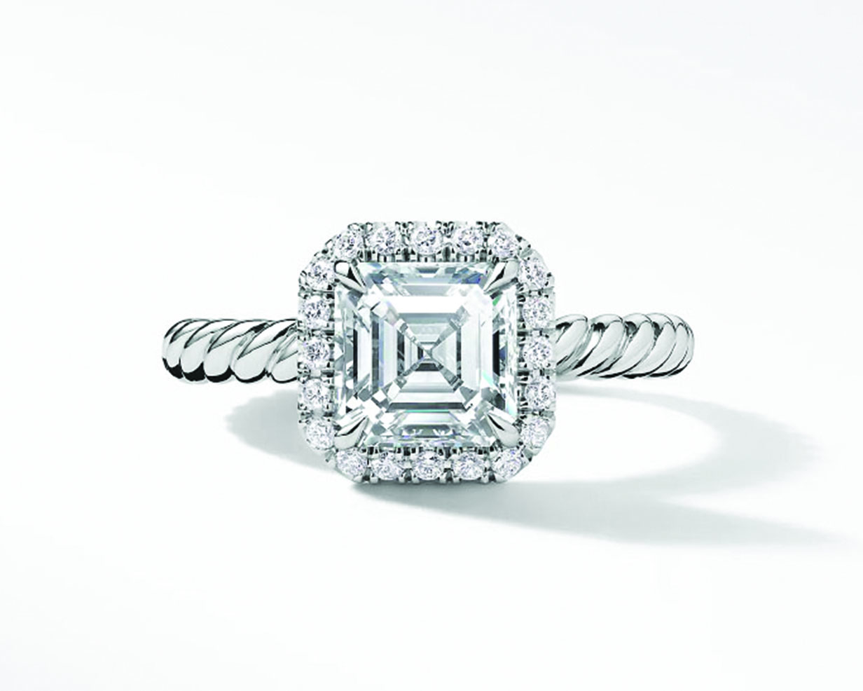 Asscher cut diamond engagement ring with paved halo and twisted platinum band