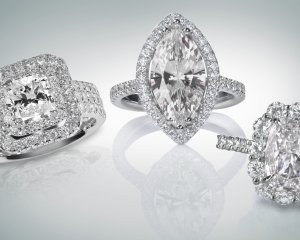 3 different types of diamond engagement rings: cushion cut diamond ring, marquise cut diamond ring, oval cut diamond ring