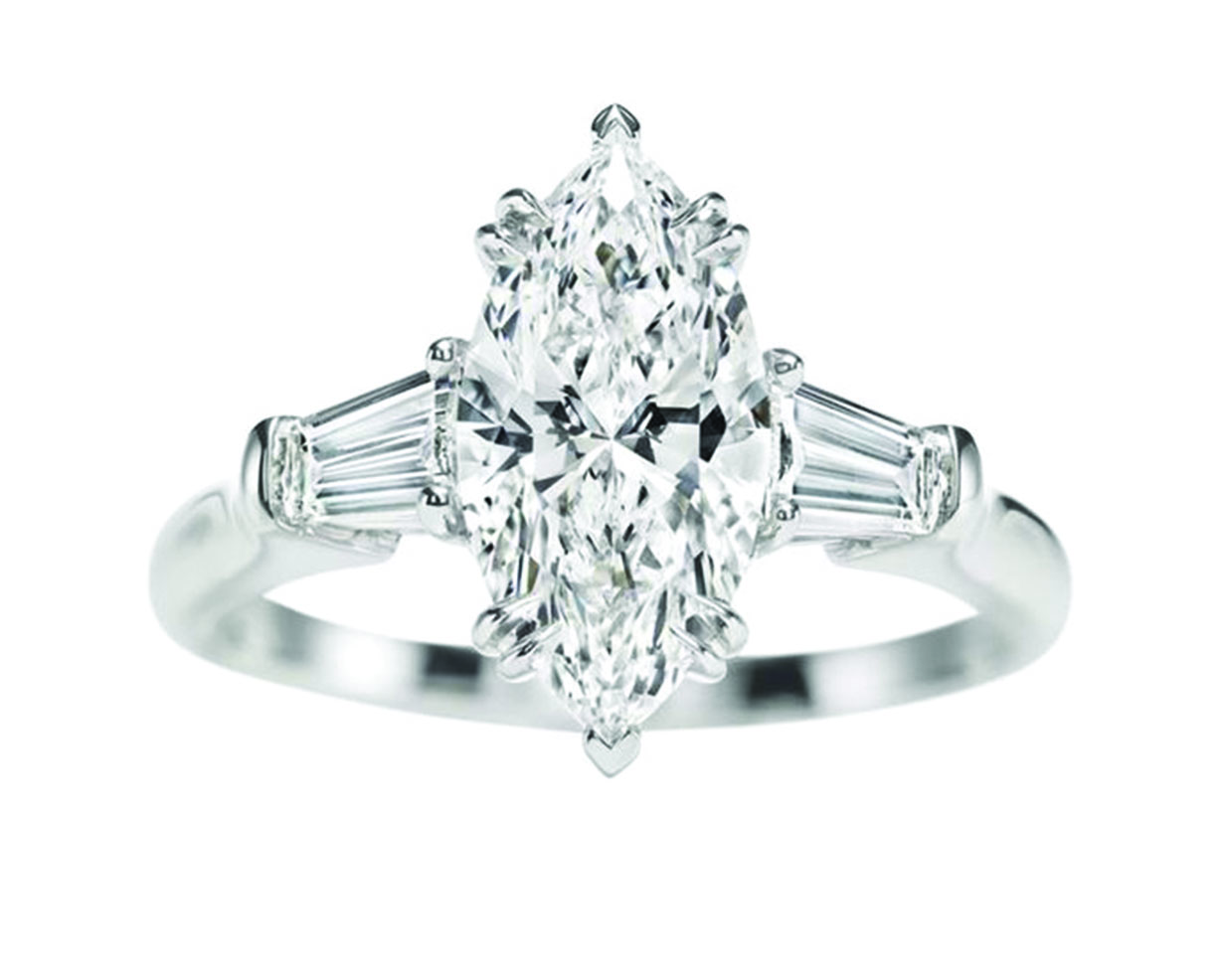 Marquise cut diamond ring with two side stones on a platinum band