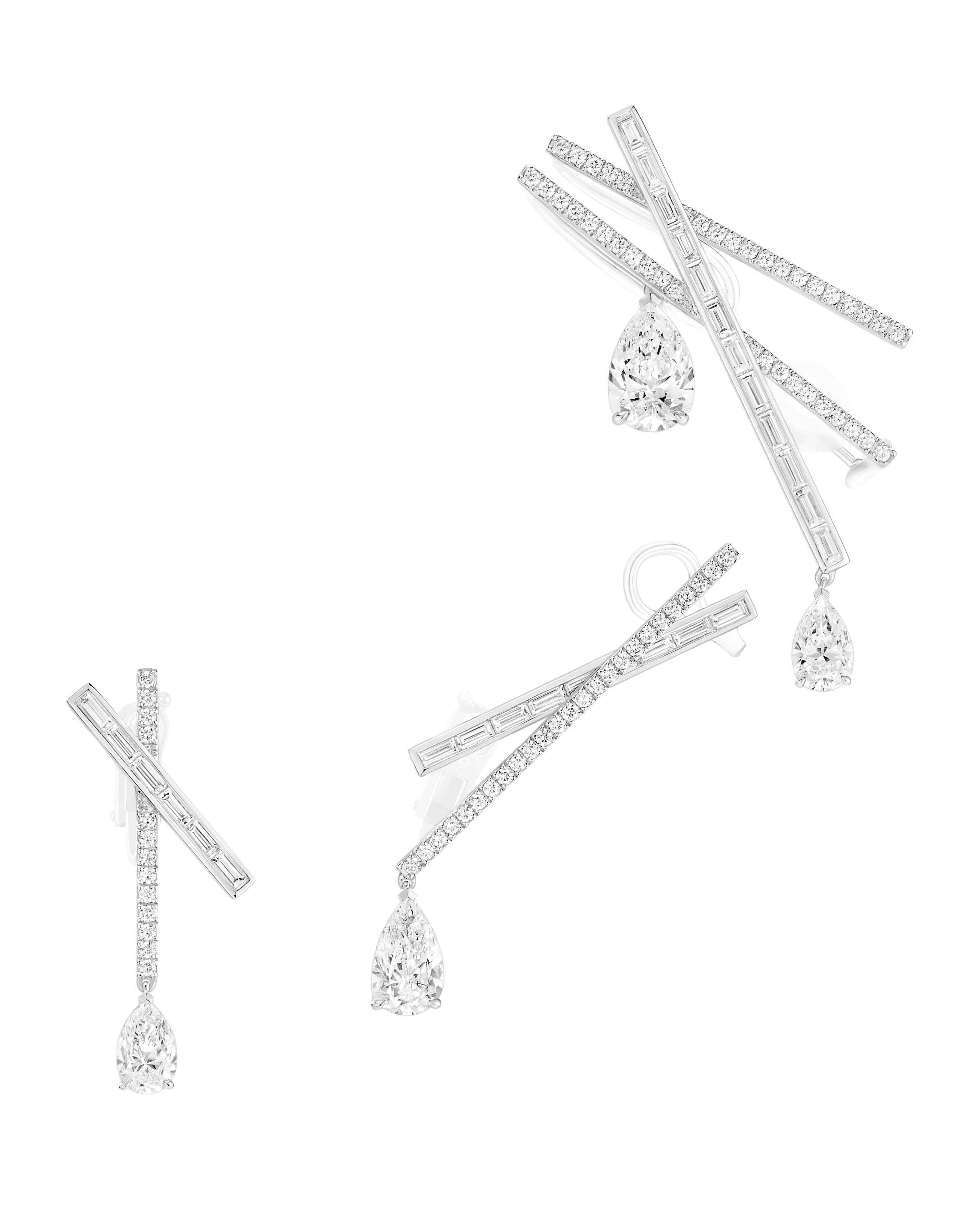 This Year's Most Epic High Jewelry Diamond Designs 6 High jewelry pear shaped diamond asymmetrical earrings with rows of round cut and baguette diamonds by Messika