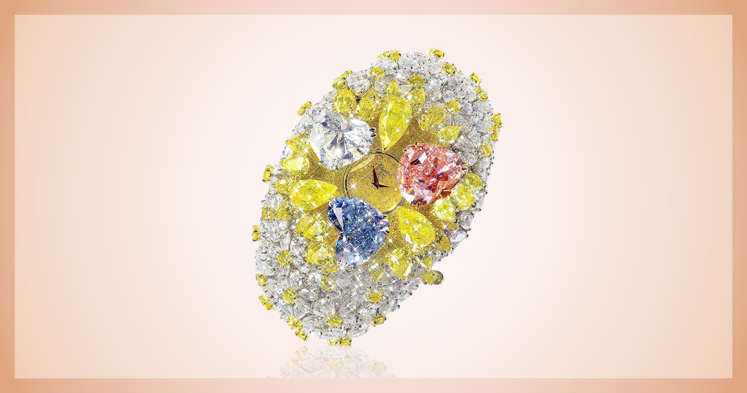 201-carat Chopard watch featuring an array of colored diamonds including several yellow diamonds, and a heart-shaped white diamond, pink diamond and blue diamond
