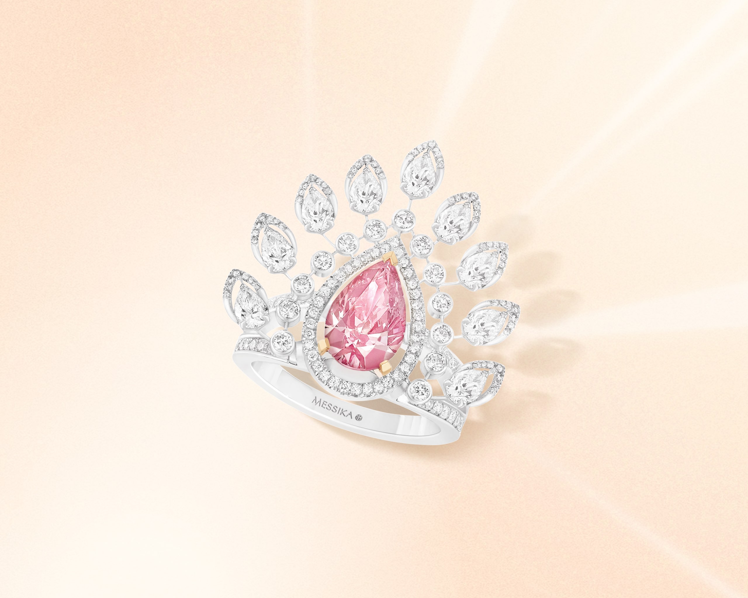 Crown shaped marquise diamond ring with pink diamond centerpiece from Desert Bloom collection by Messika 