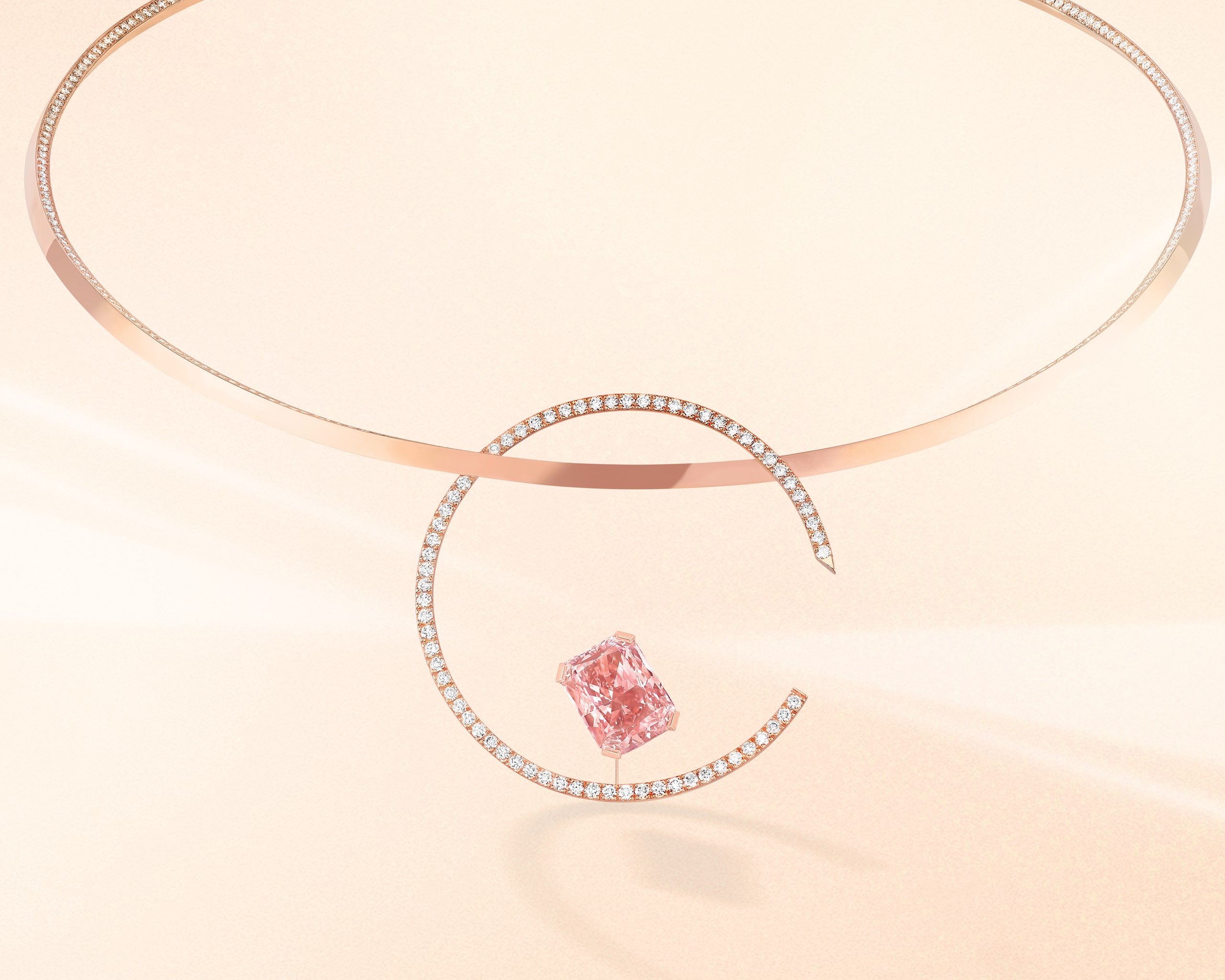 Rose gold diamond choker necklace with asymmetric fancy pink radiant cut diamond and accenting diamonds from Messika
