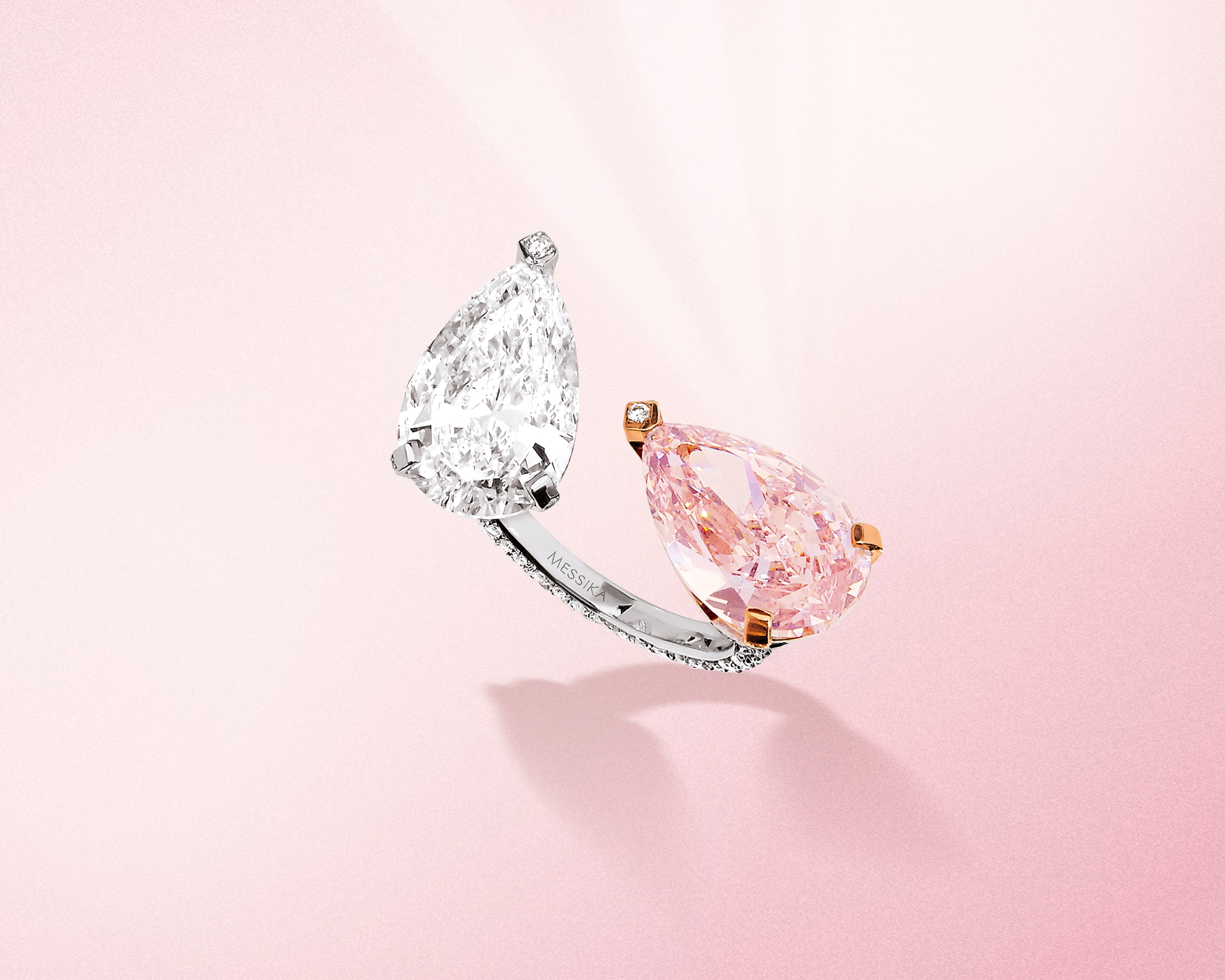 Pear shaped white and pink diamond ring in a toi et moi setting on a platinum band from Messika