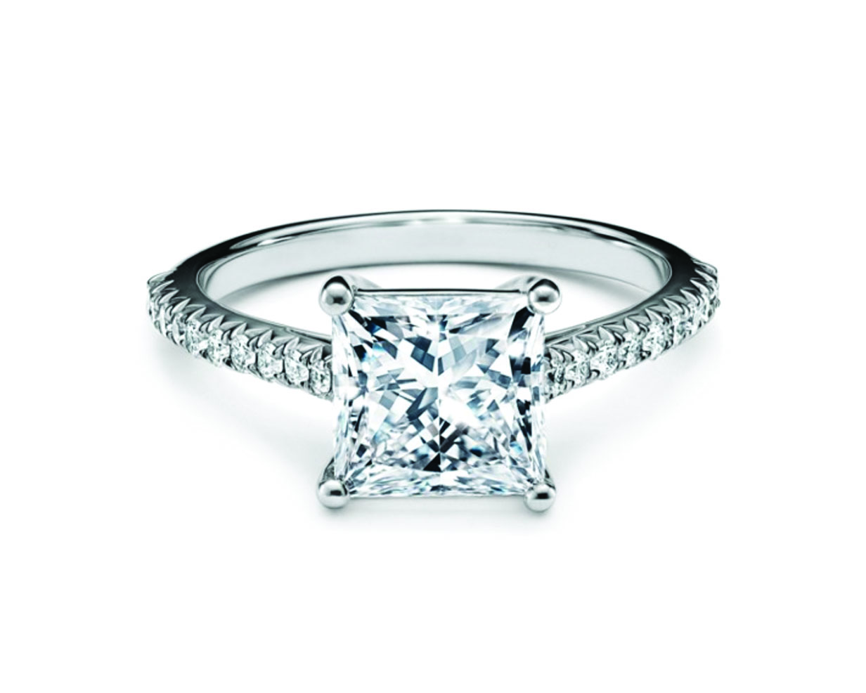 Princess cut diamond engagement ring with a platinum diamond band