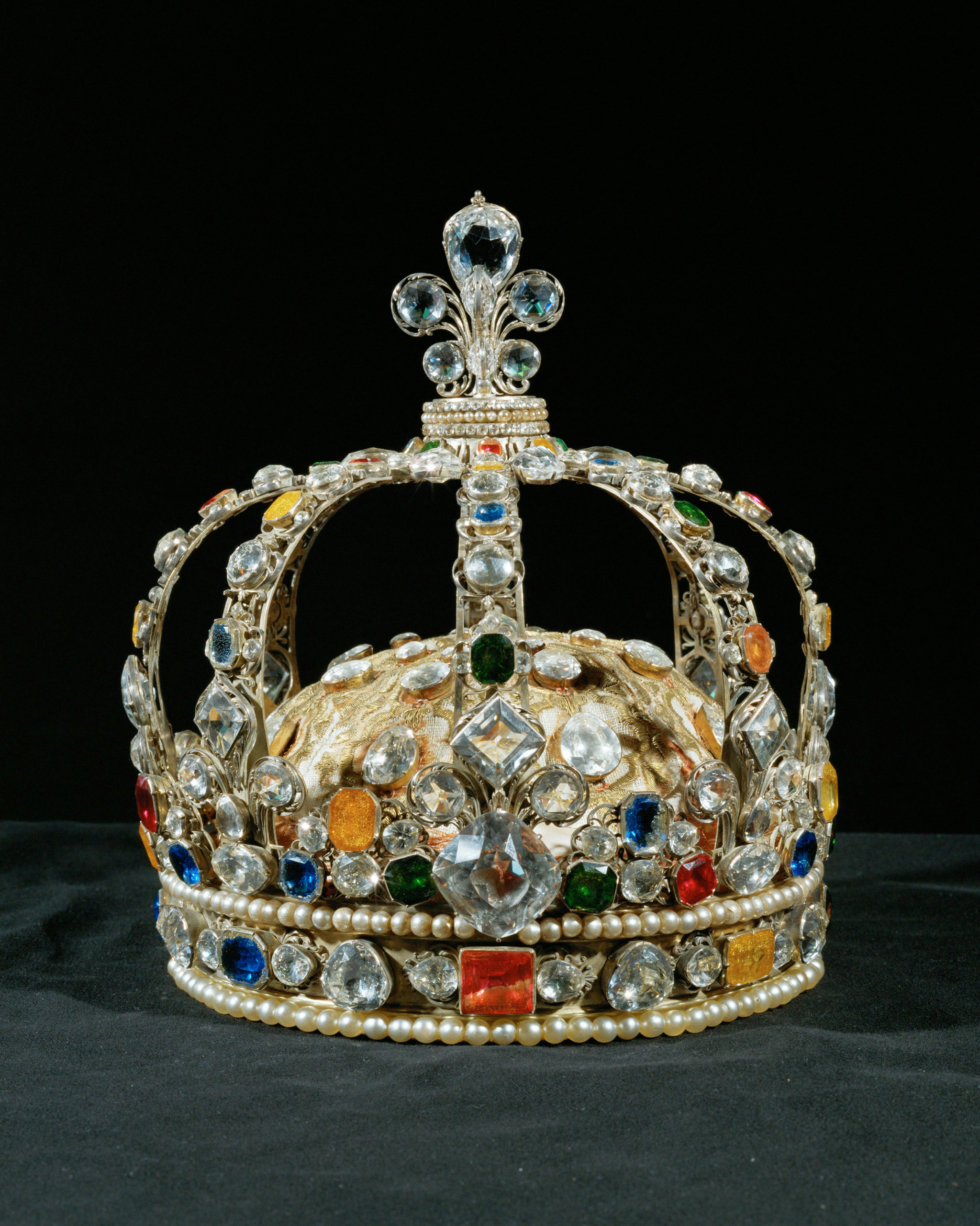 The Crown of Louis XV, embellished with Le Grand Mazarin diamond, sapphires, topazes, emeralds, rubies, and 2 rows of pearls 