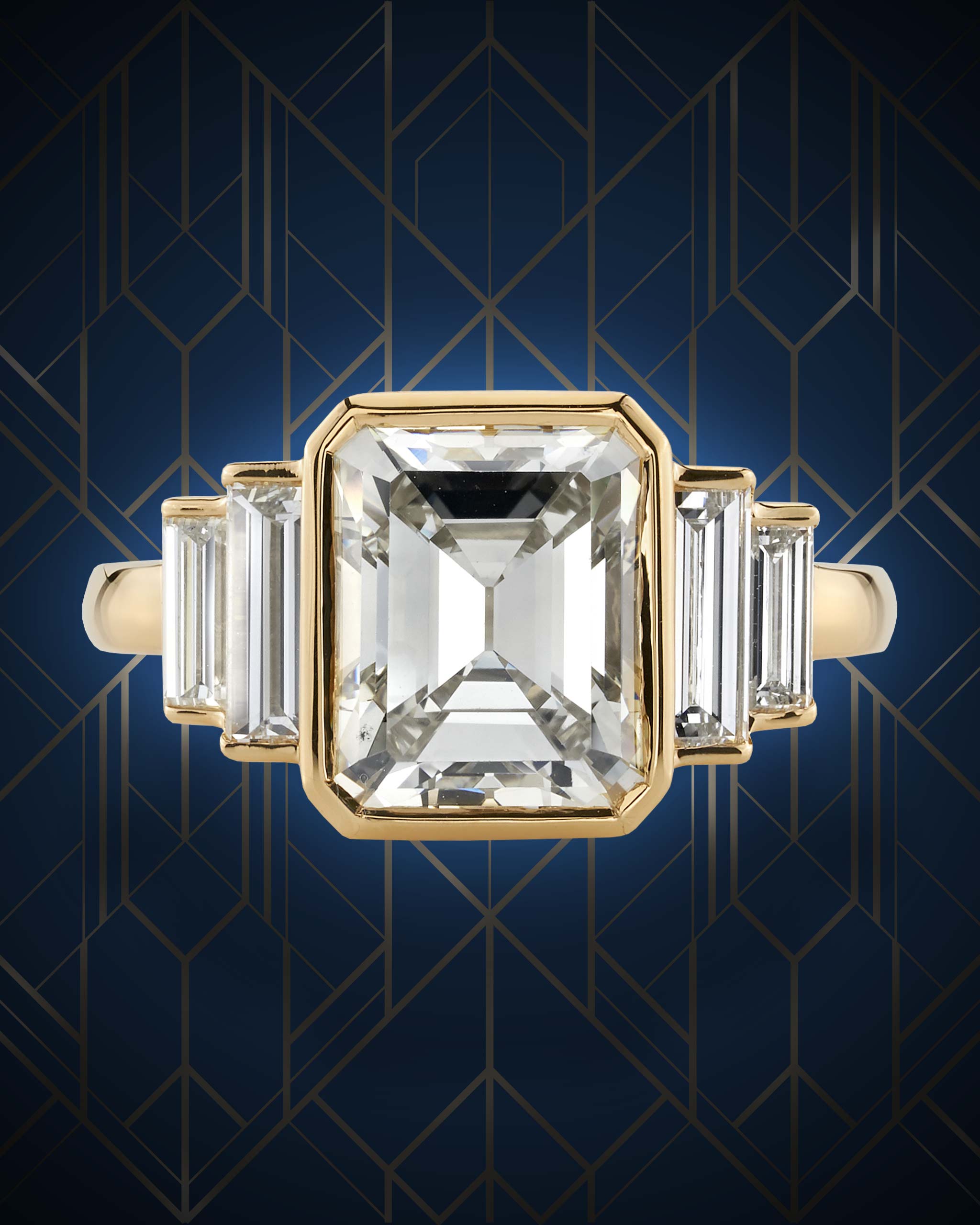Cushion cut diamond Art Deco ring hugged by baguette diamonds set within yellow gold band from Single Stone
