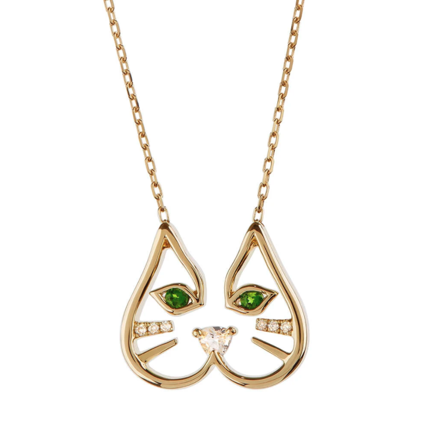 Diamond pendant necklace in the shape of a cat with green dioptase eye jewels and a white diamond nose 