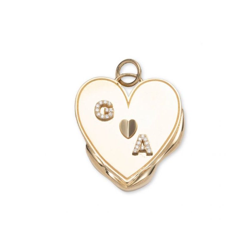 Diamond heart shaped pendant necklace engraved with personalized initials set within 18k gold