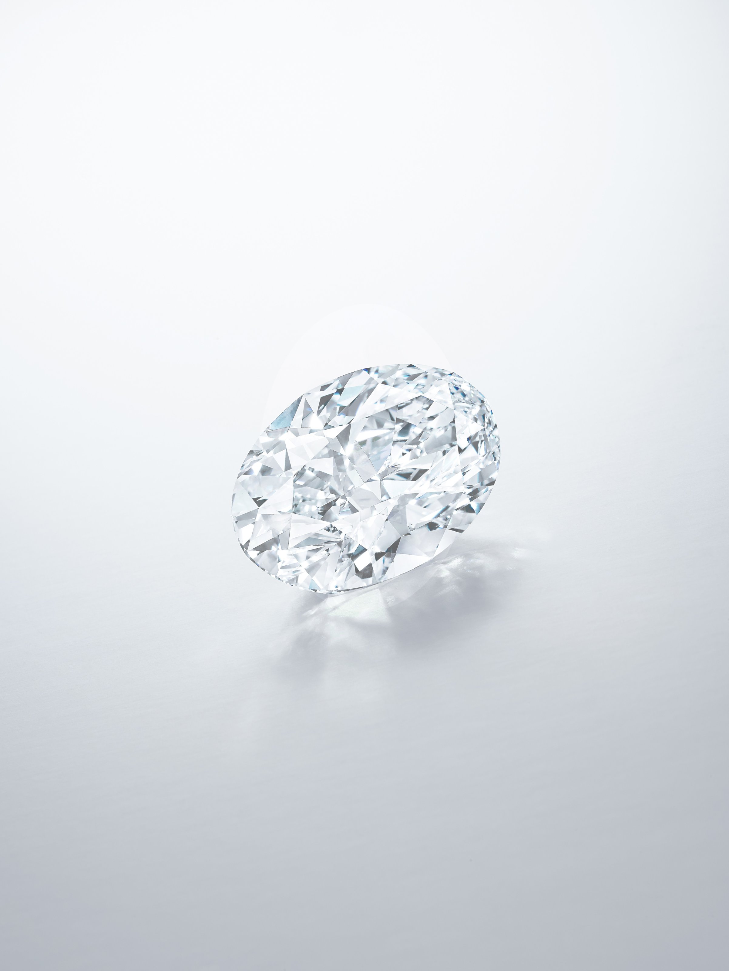 Oval cut 102 carat diamond from the Sotheby's jewelry auction showcasing brilliant diamond facets 