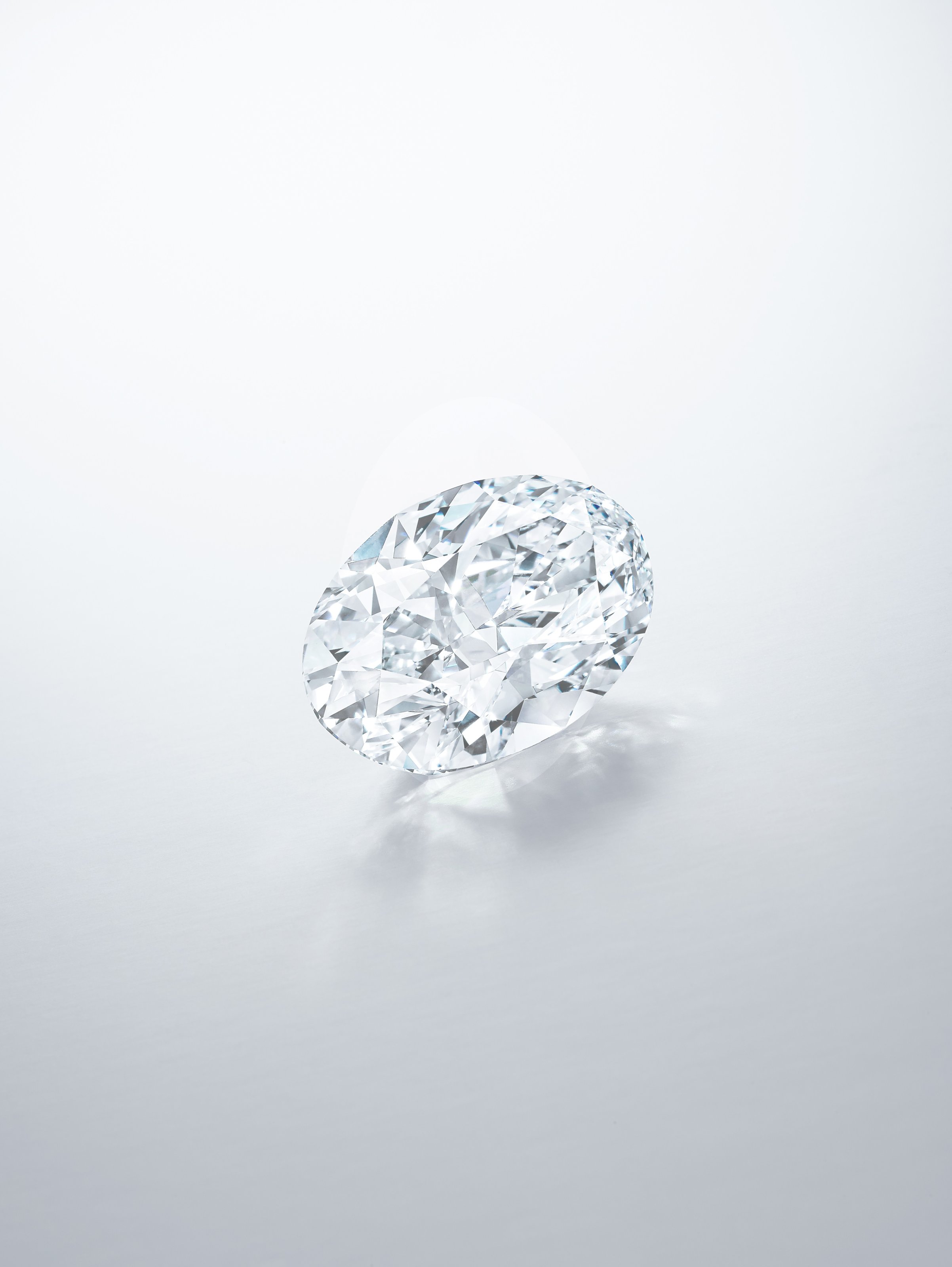 Oval cut 102 carat diamond from the Sotheby's jewelry auction showcasing brilliant diamond facets