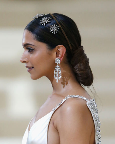Deepika Padukone wearing a vintage star diamond tiara reversed over the top of her head at the 2017 Met Gala
