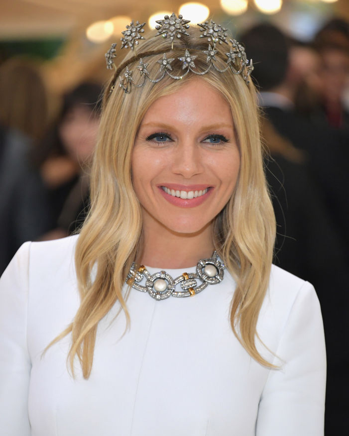 Sienna Miller wearing two vintage diamond tiaras from Fred Leighton at the 2018 Met Gala