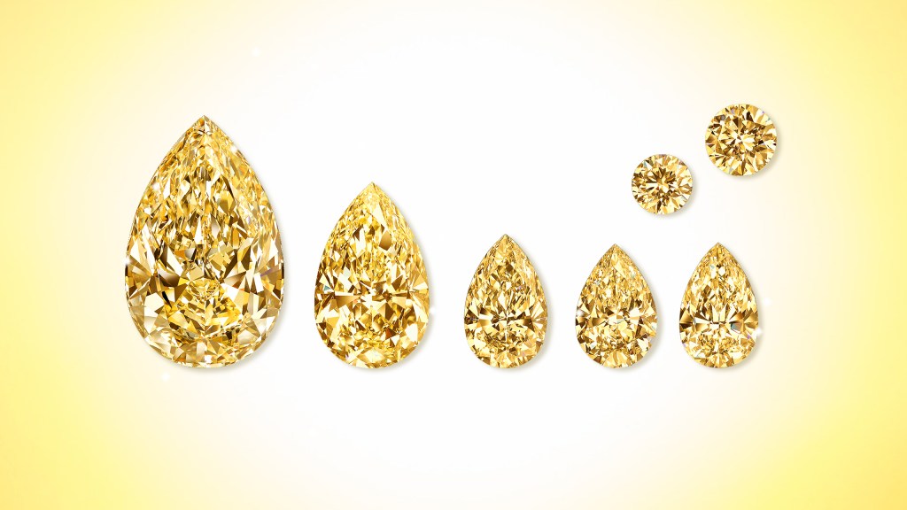 The Golden Empress' Satellite Stones: assortment of yellow, brilliant round cut & pear shaped diamonds from Graff