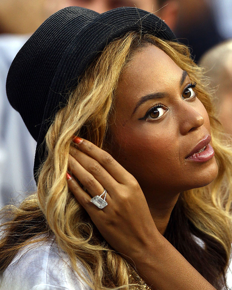 Beyonce's engagement ring is an emerald cut diamond engagement ring with a platinum band from Lorraine Schwartzv