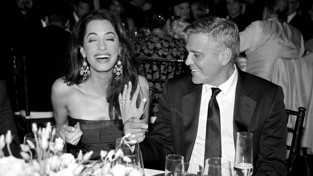 Amal Clooney wearing emerald cut diamond engagement ring
