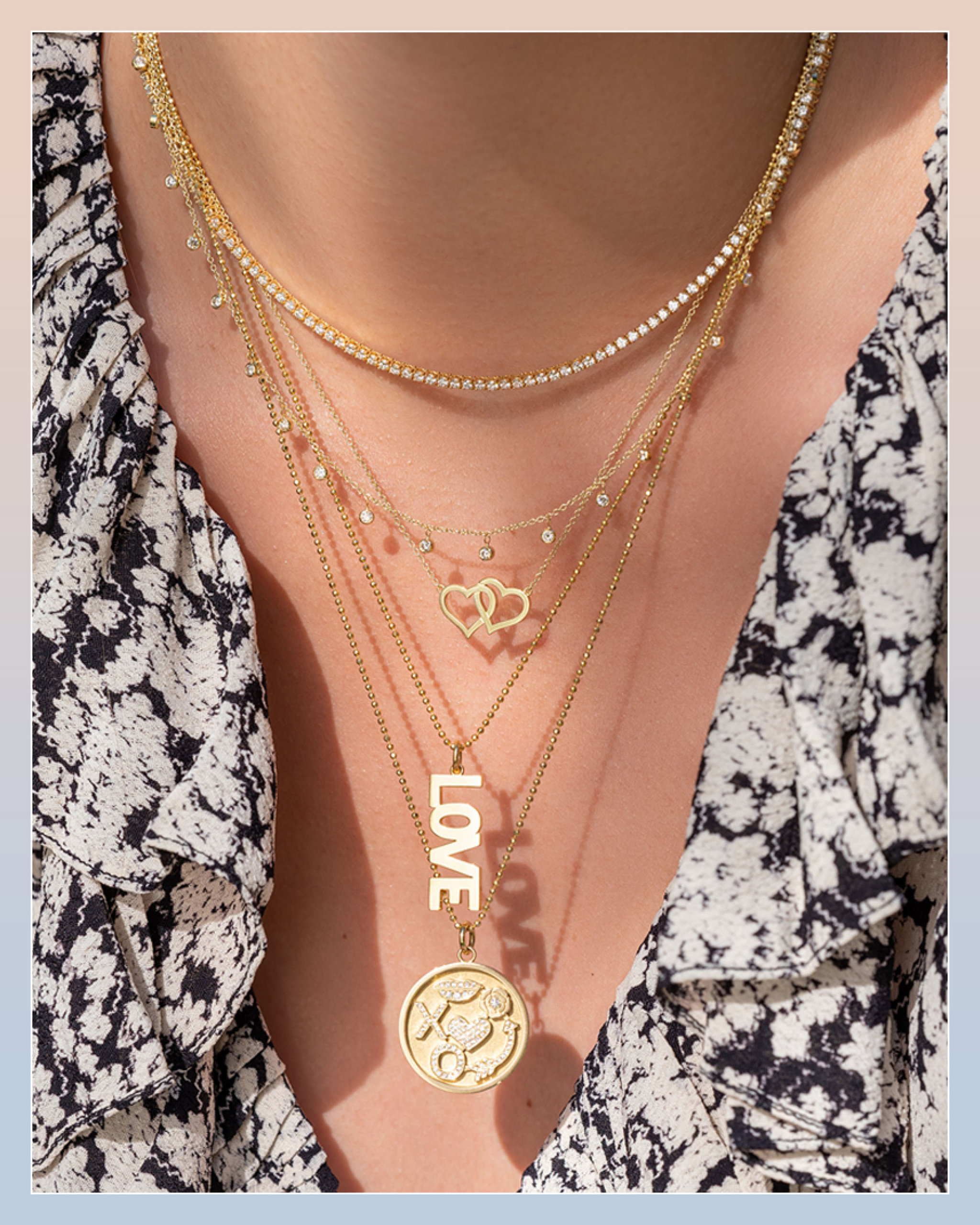 Diamond tennis necklace and diamond charm necklace paired with gold pendant, love & heart necklaces by Jennifer Meyer