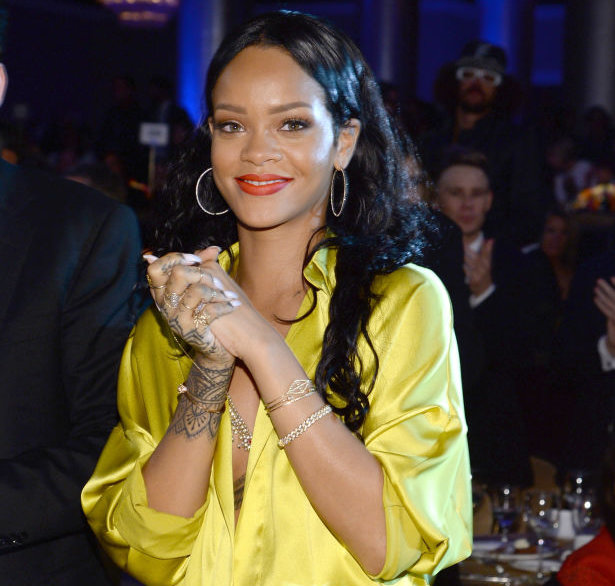 Why Diamond Hoop Earrings Are a Style Staple—Then and Now 2 Rihanna earrings look featuring simple diamond hoop earrings at the Clive Davis Pre Grammy Party in 2014