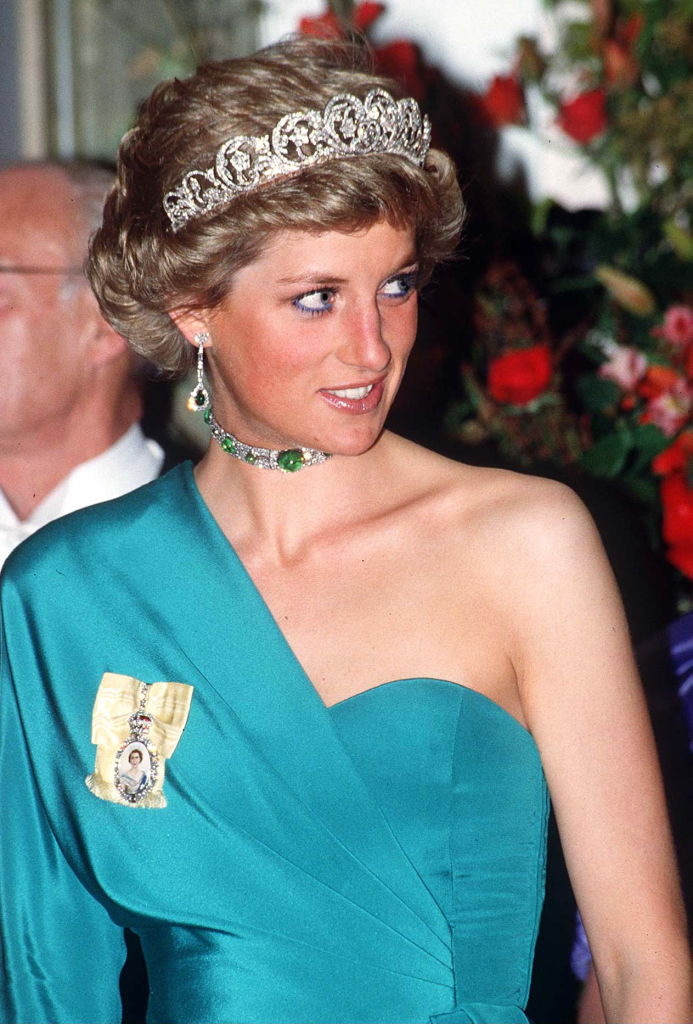 Princess Diana wearing the Spencer Tiara, diamond pendant earrings and a diamond choker with cabochon emeralds