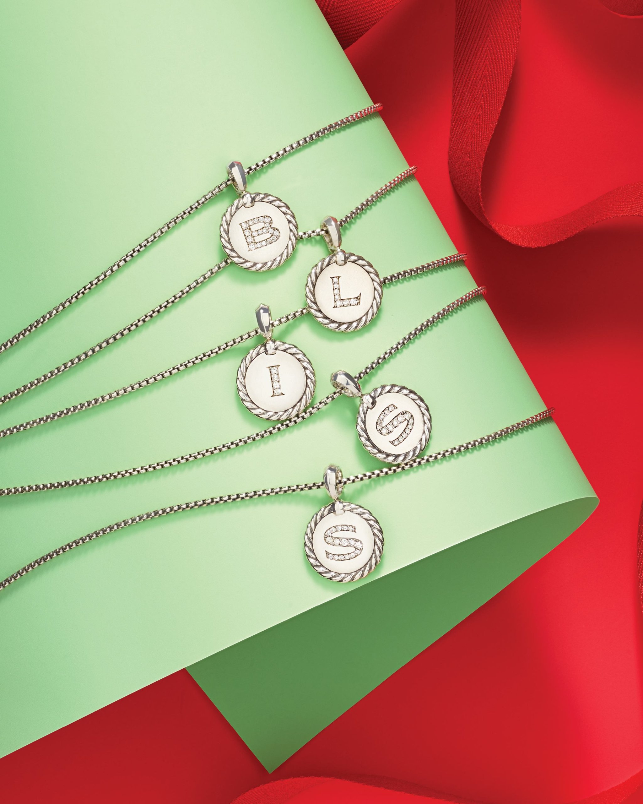 Diamond Letter Initial Jewelry pendant necklaces featuring a B pendant, L pendant, I pendant & S pendant set in platinum from David Yurman