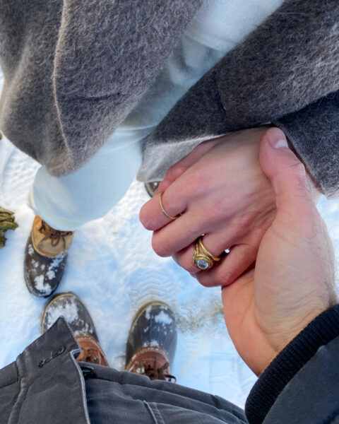 Eden Grinshpan holding Ido Nivron's hand