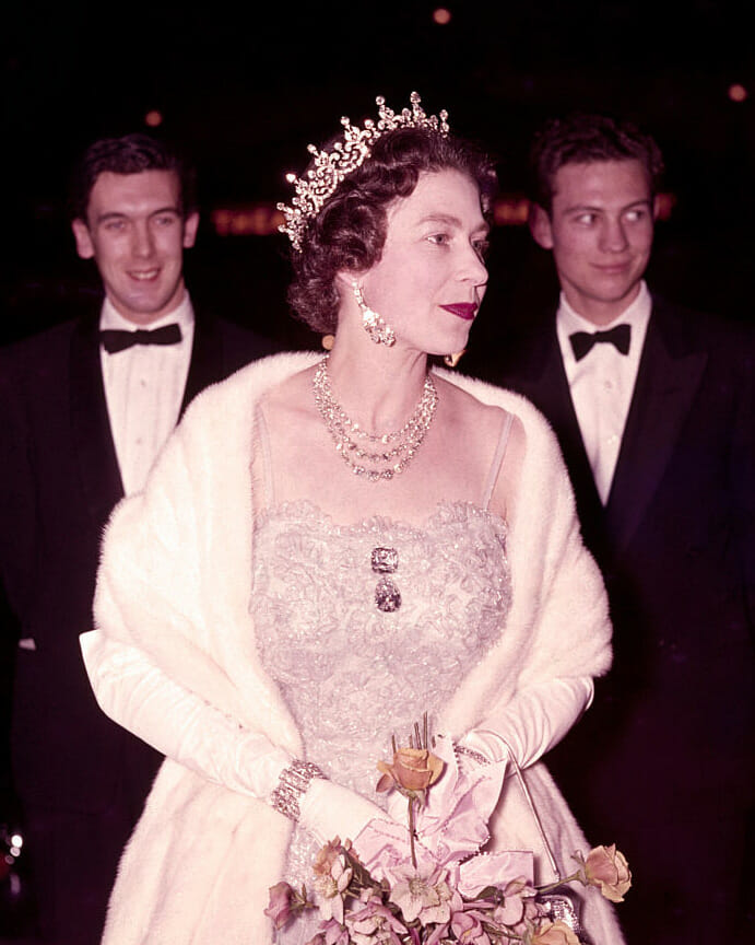 Queen Elizabeth II wearing the Festoon Necklace with Queen Mary's Girls of Great Britain and Ireland Tiara in 1962. 