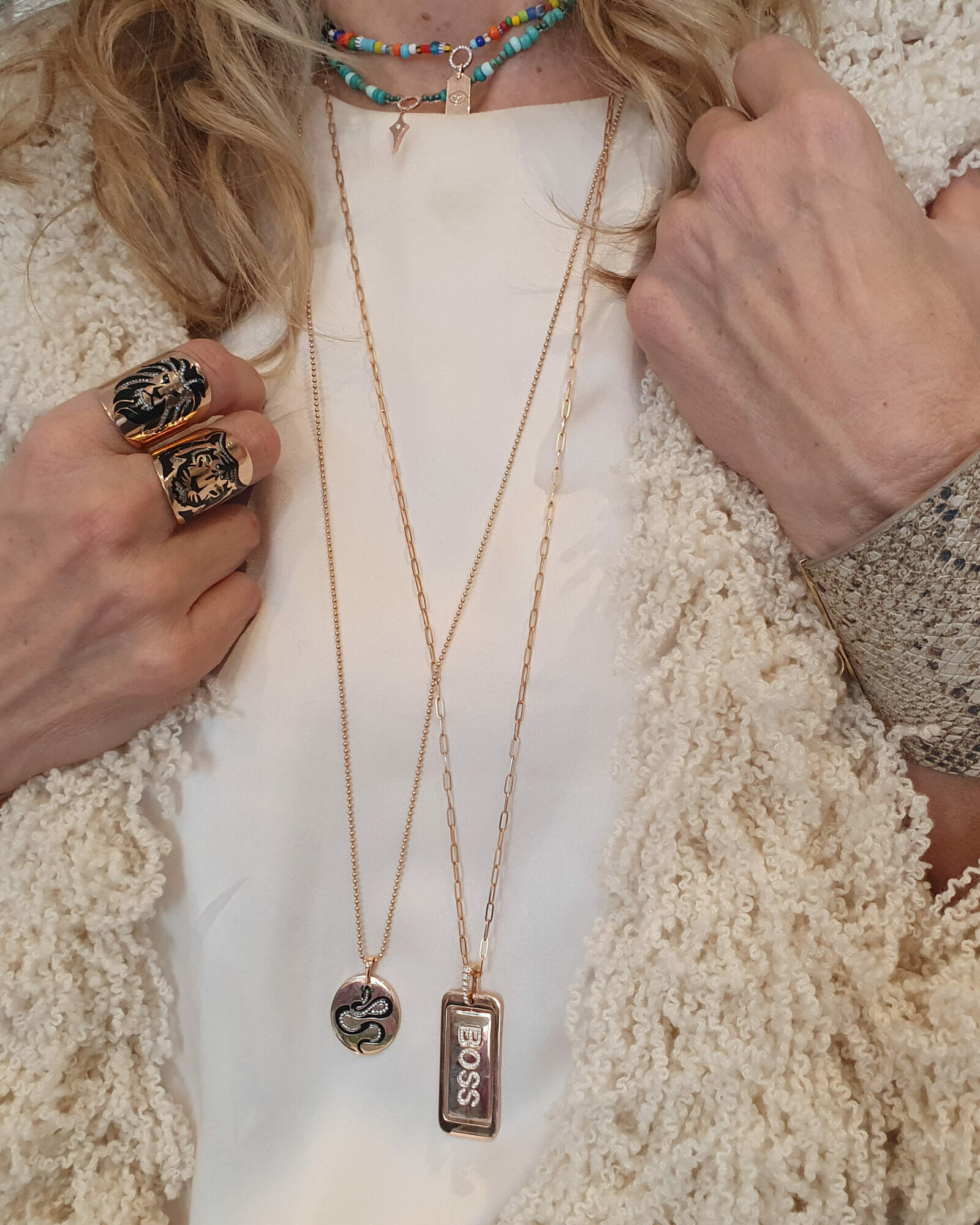 Layered Necklaces and stacked rings.