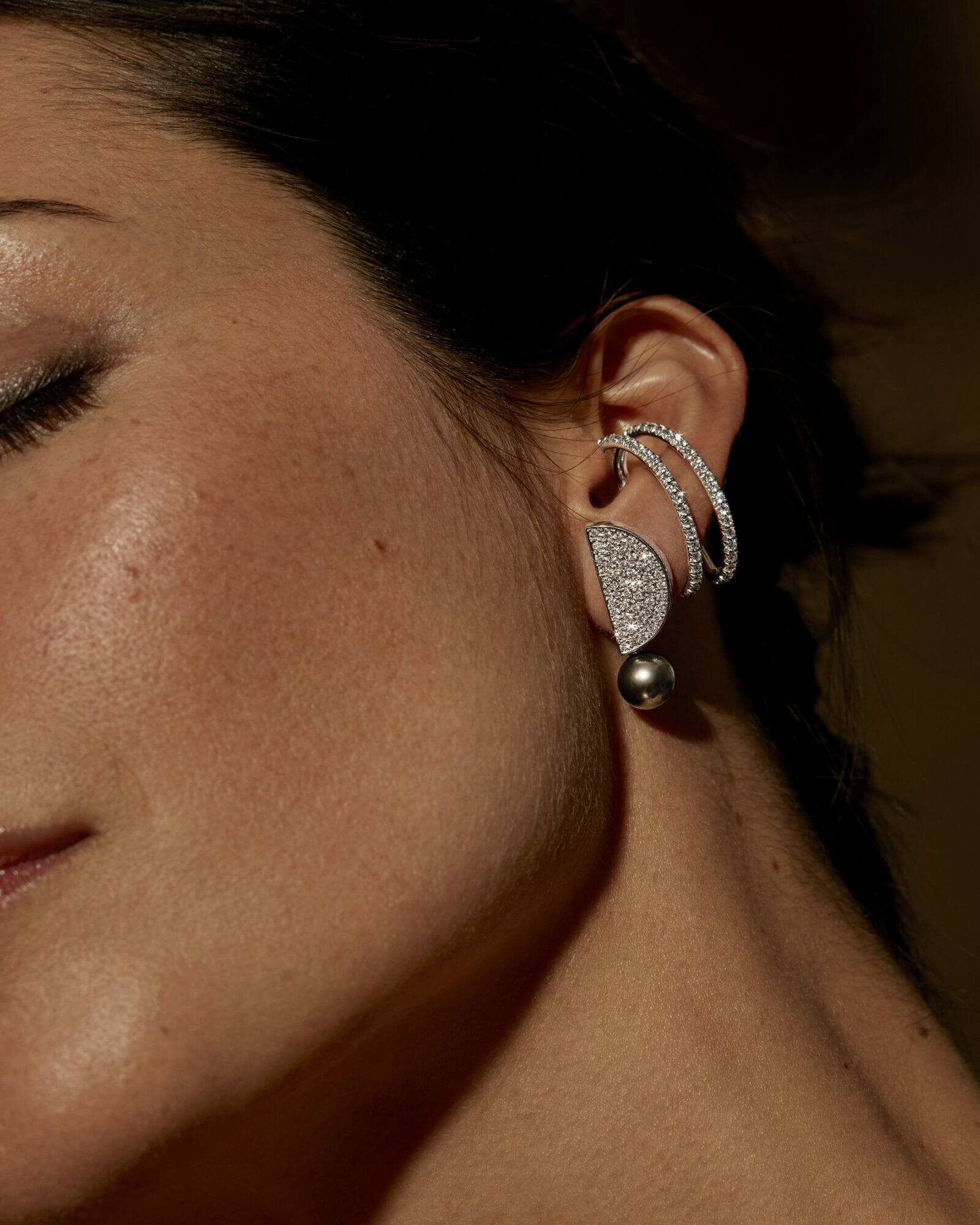 Diamonds and pearls, woman wearing earrings