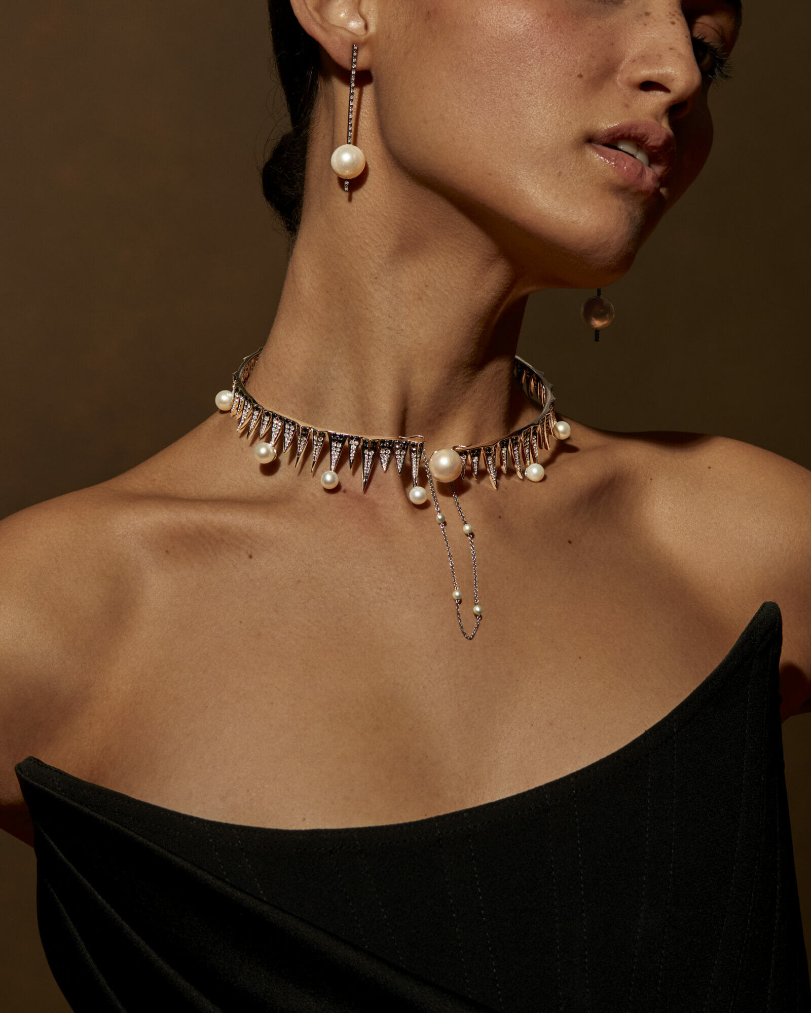Diamonds and pearls, woman wearing earrings and collar necklace