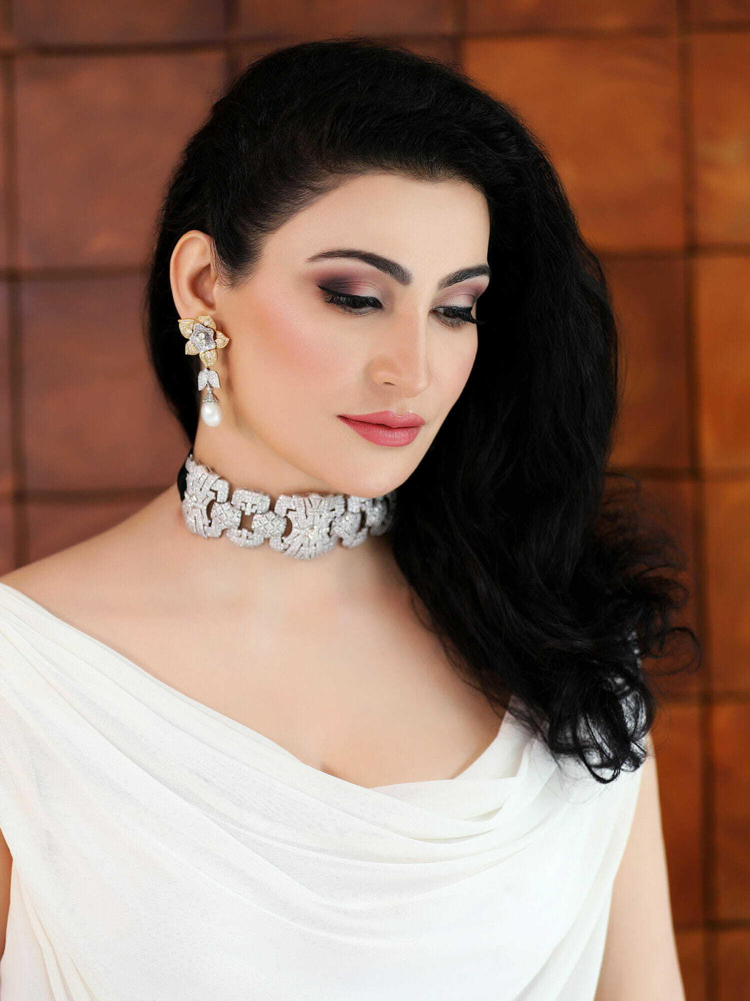 Passi pairs her stunning white diamond choker in the Art Deco style with equally gorgeous diamond earrings from her personal jewellery collection