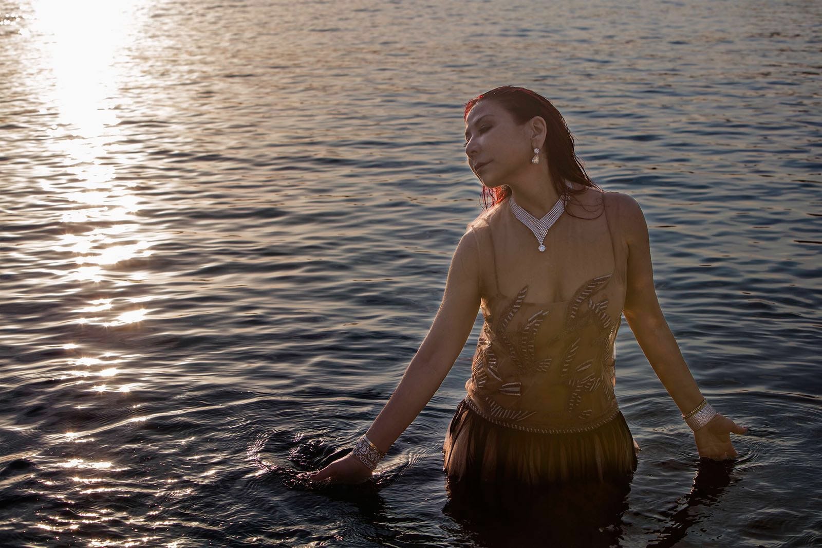Bling Empire star Anna Shay in the water wearing diamonds 