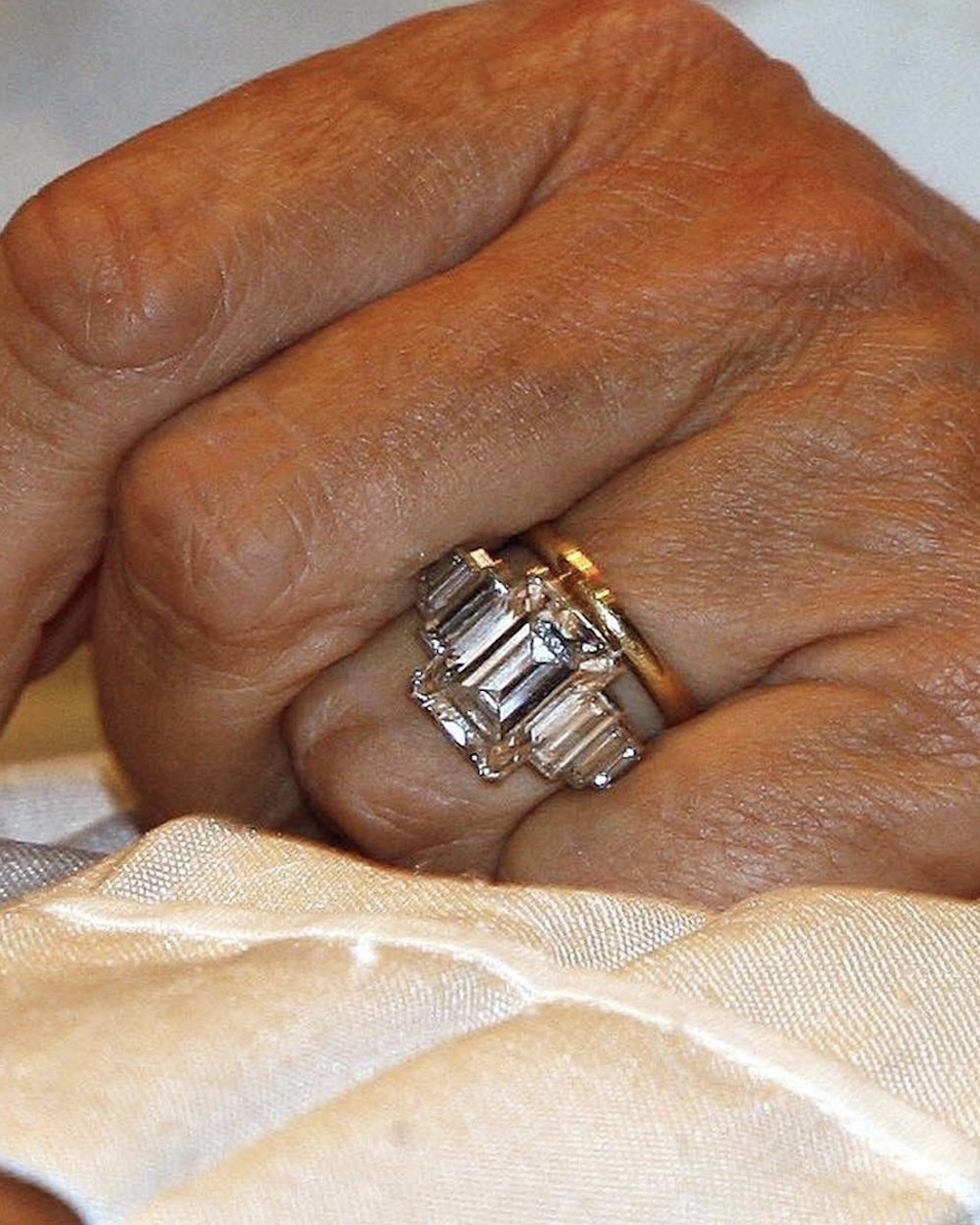 Queen Camilla's Art Deco-Style Emerald-Cut Diamond Royal Engagement Ring