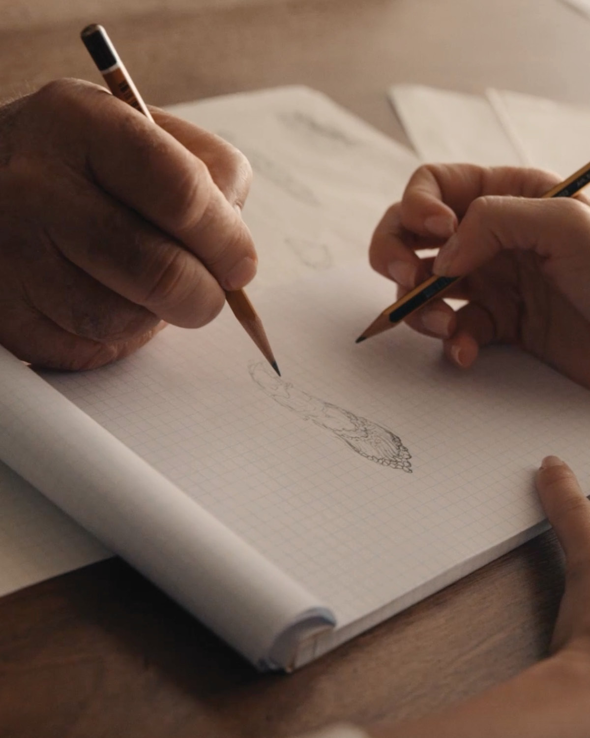 Andrea Buccellati showing daughter Lucrezia how to design.