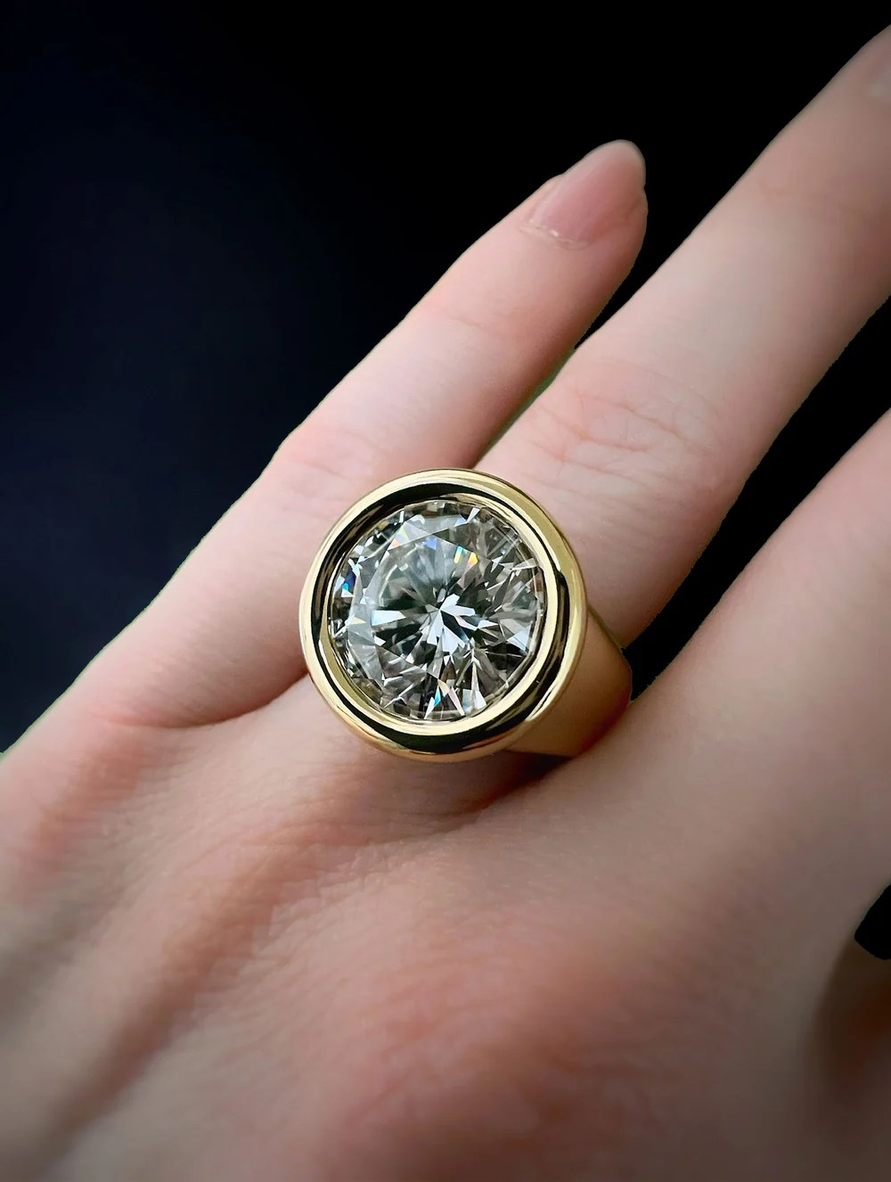 How to Make an Engagement Ring Look Bigger: 9 Designer-Approved Hacks 11 How to Make an Engagement Ring Look Bigger: 9 Designer-Approved Hacks