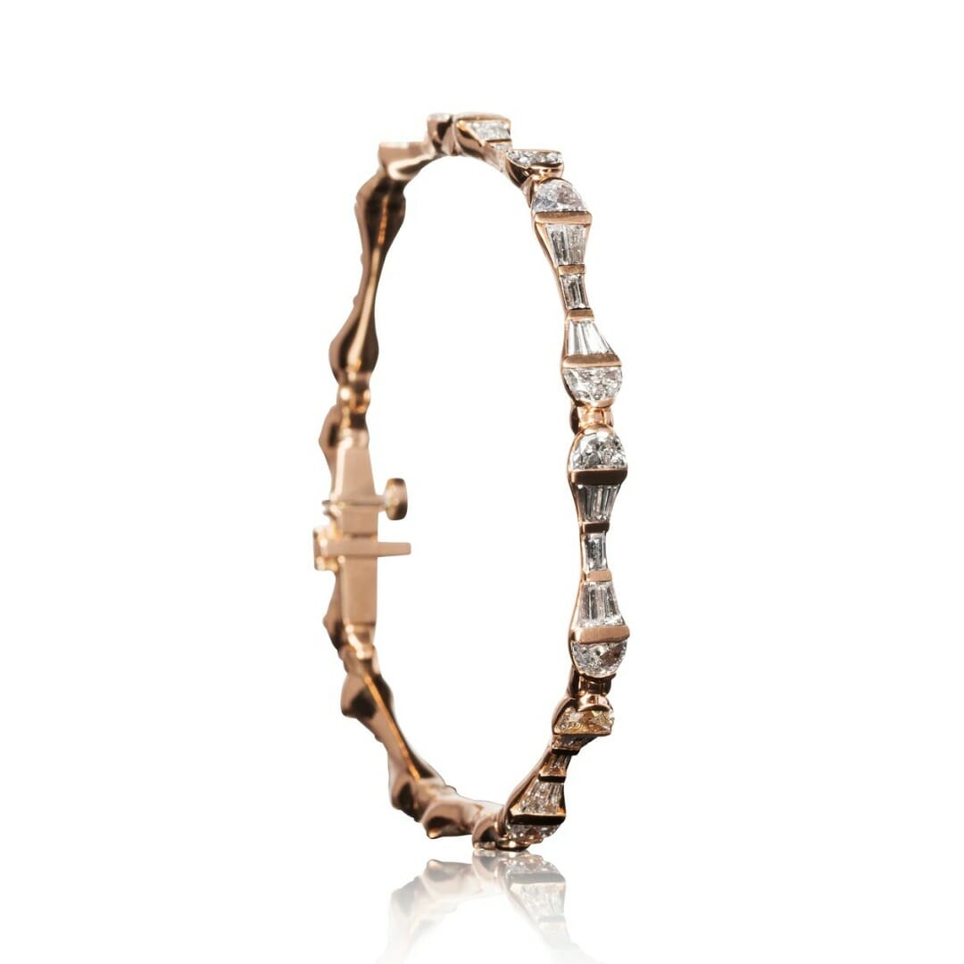 The History of Natural Diamond Tennis Bracelets and 10 Must-Have Pieces 8 Nak Armstrong tapered baguette diamond tennis bracelet