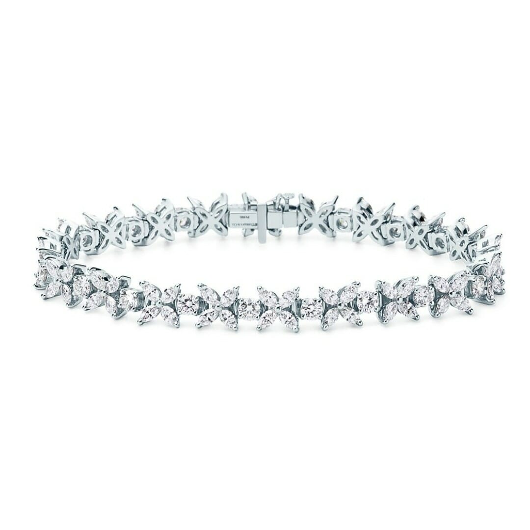 The History of Natural Diamond Tennis Bracelets and 10 Must-Have Pieces 4 Cluster Tennis Bracelet
in Platinum with Diamond