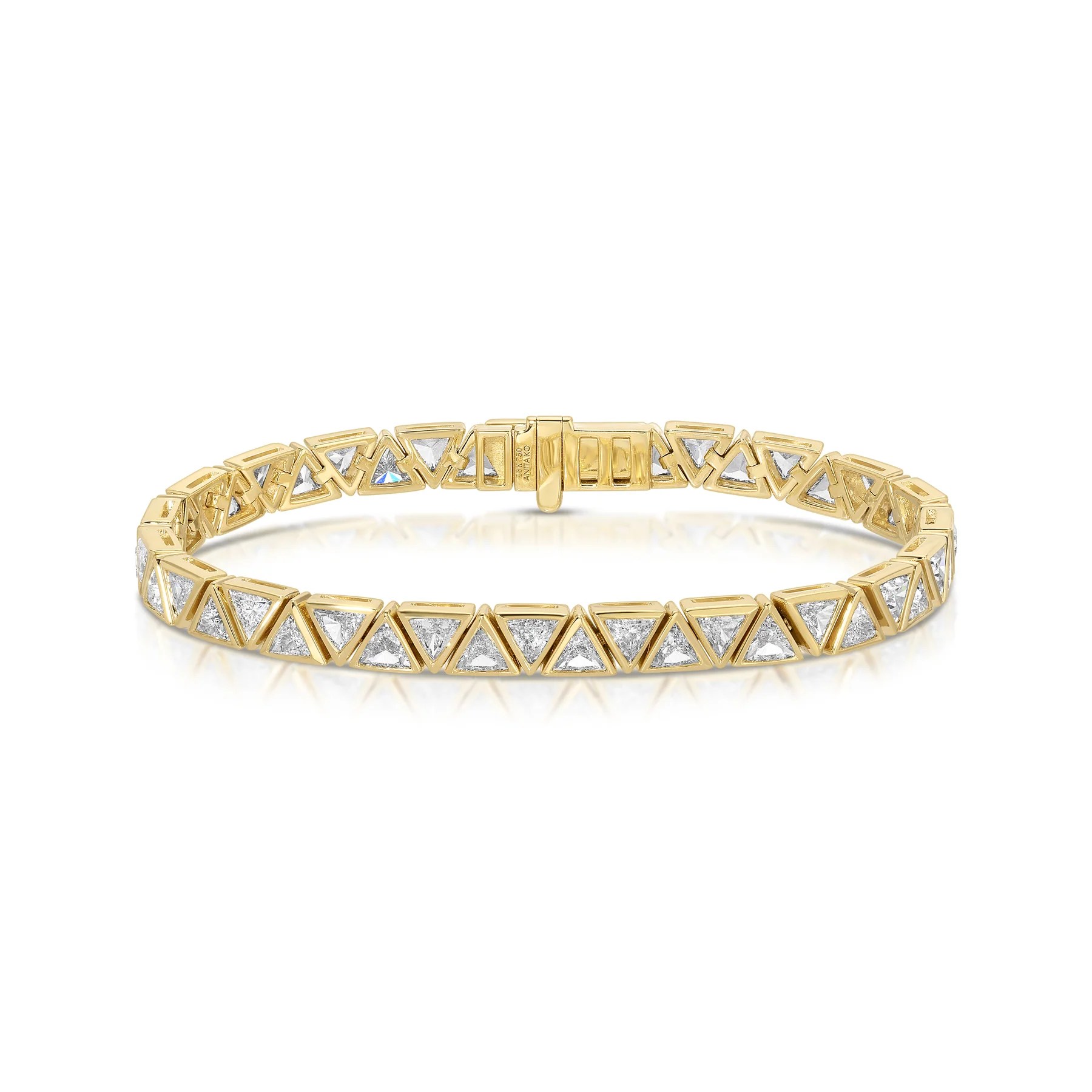 7 Reasons Trillion Cut Diamonds Deserve Your Full Attention 10 trillion cut diamond bracelet