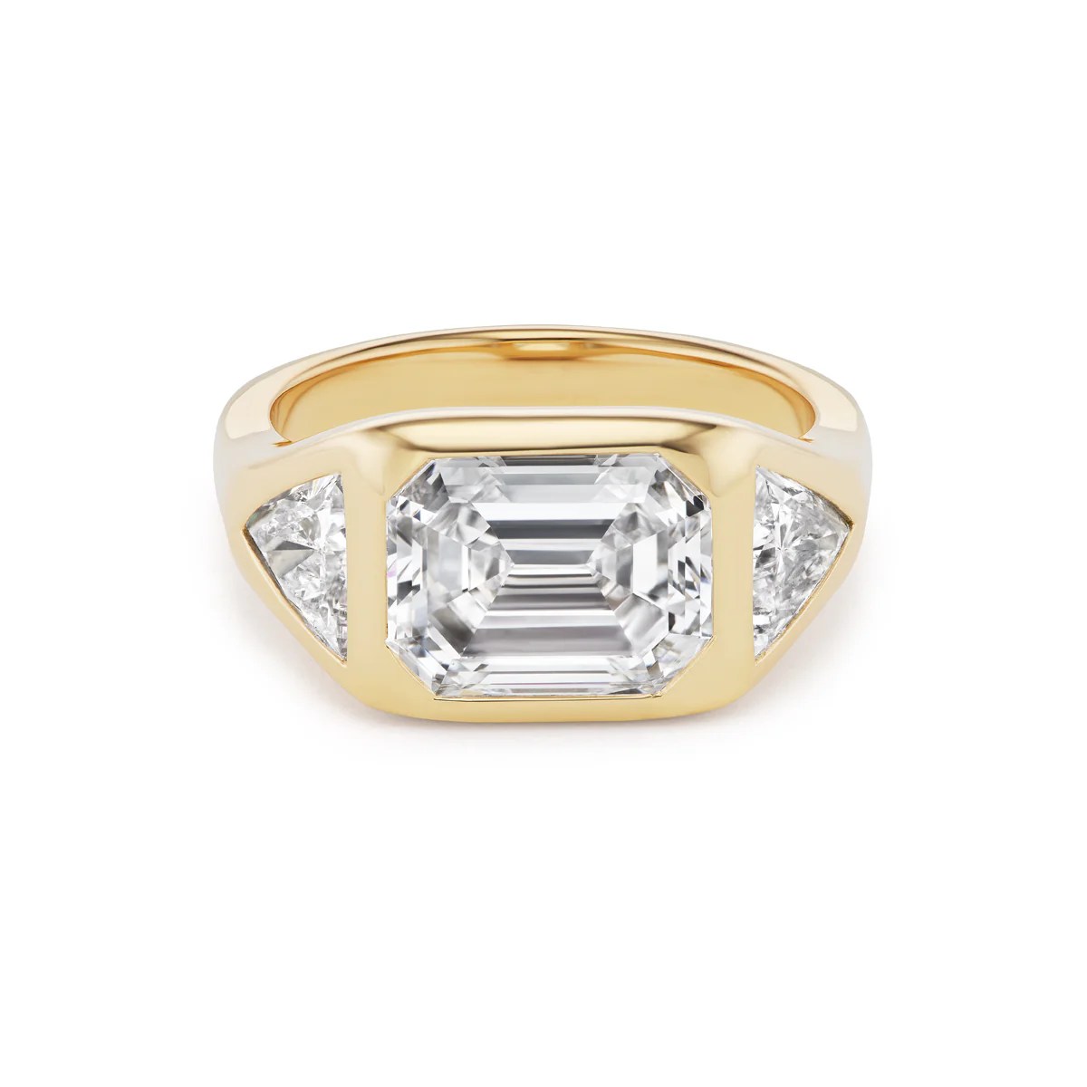 7 Reasons Trillion Cut Diamonds Deserve Your Full Attention 5 three stone ring with trillion cut diamond side stones