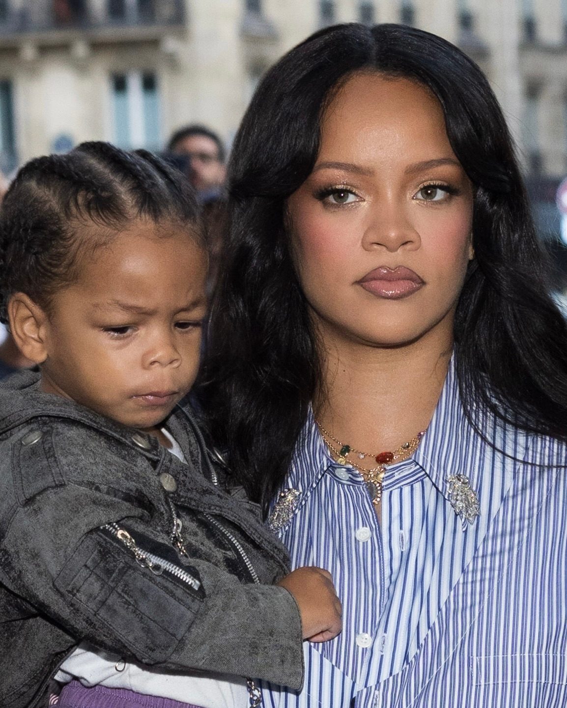 Rihanna Wore Joseph Saidian & Sons Diamond Brooches during Paris Fashion Week at the AWGE Menswear fashion show to support A$AP Rocky, with thier son Riot
