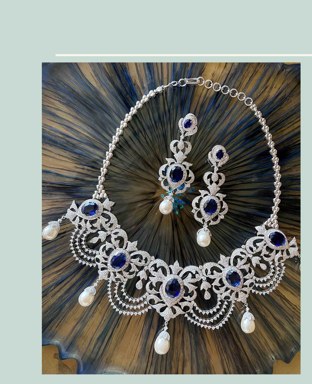 Re-Imagined Heirloom Necklace: Sparkling Diamonds Circling Blue Sapphires