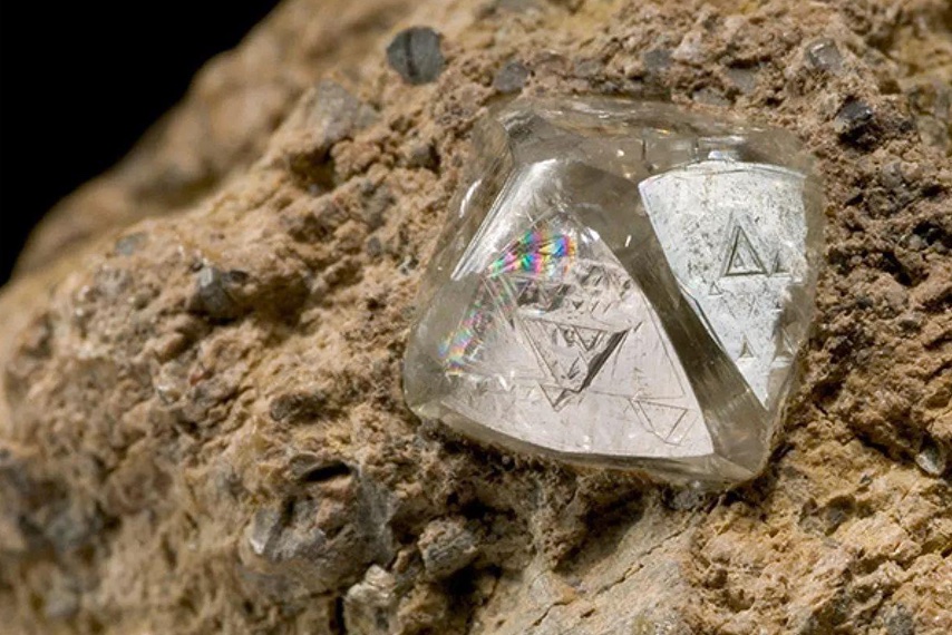 Raw diamond embedded in volcanic rock
