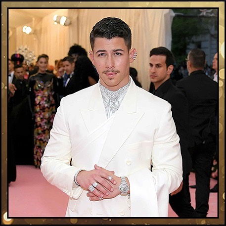 Nick Jonas wearing diamonds 