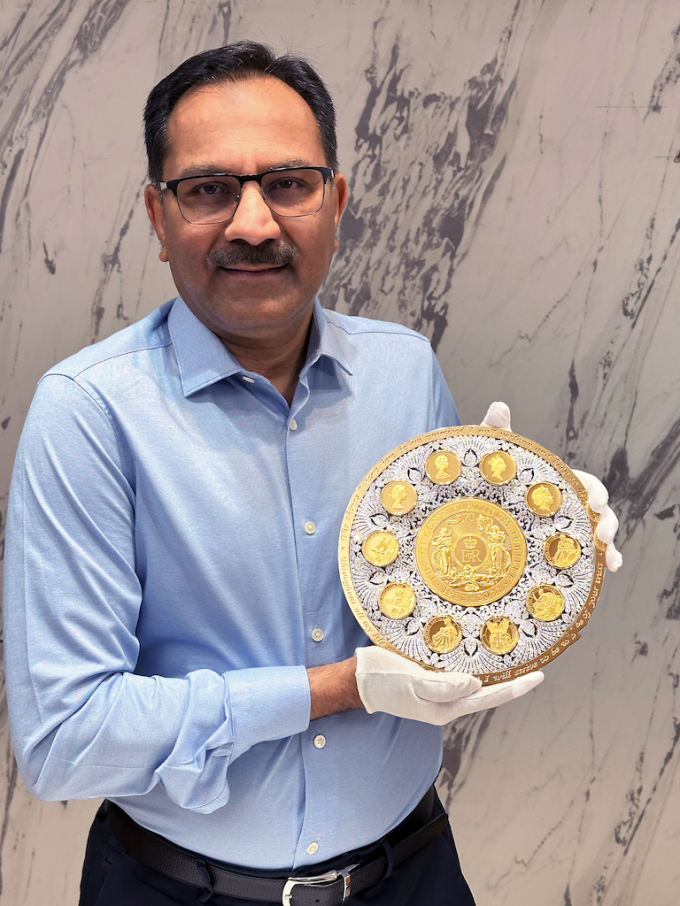 Sanjiv Mehta with 'The Crown Coin' (Courtesy of East India Company)