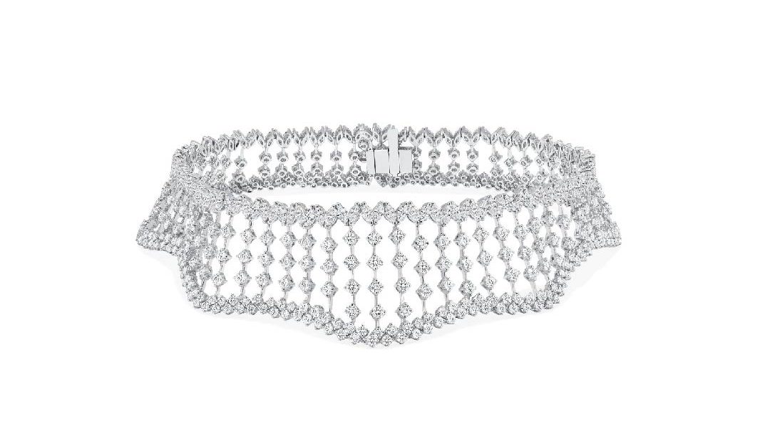 A diamond necklace on a white background