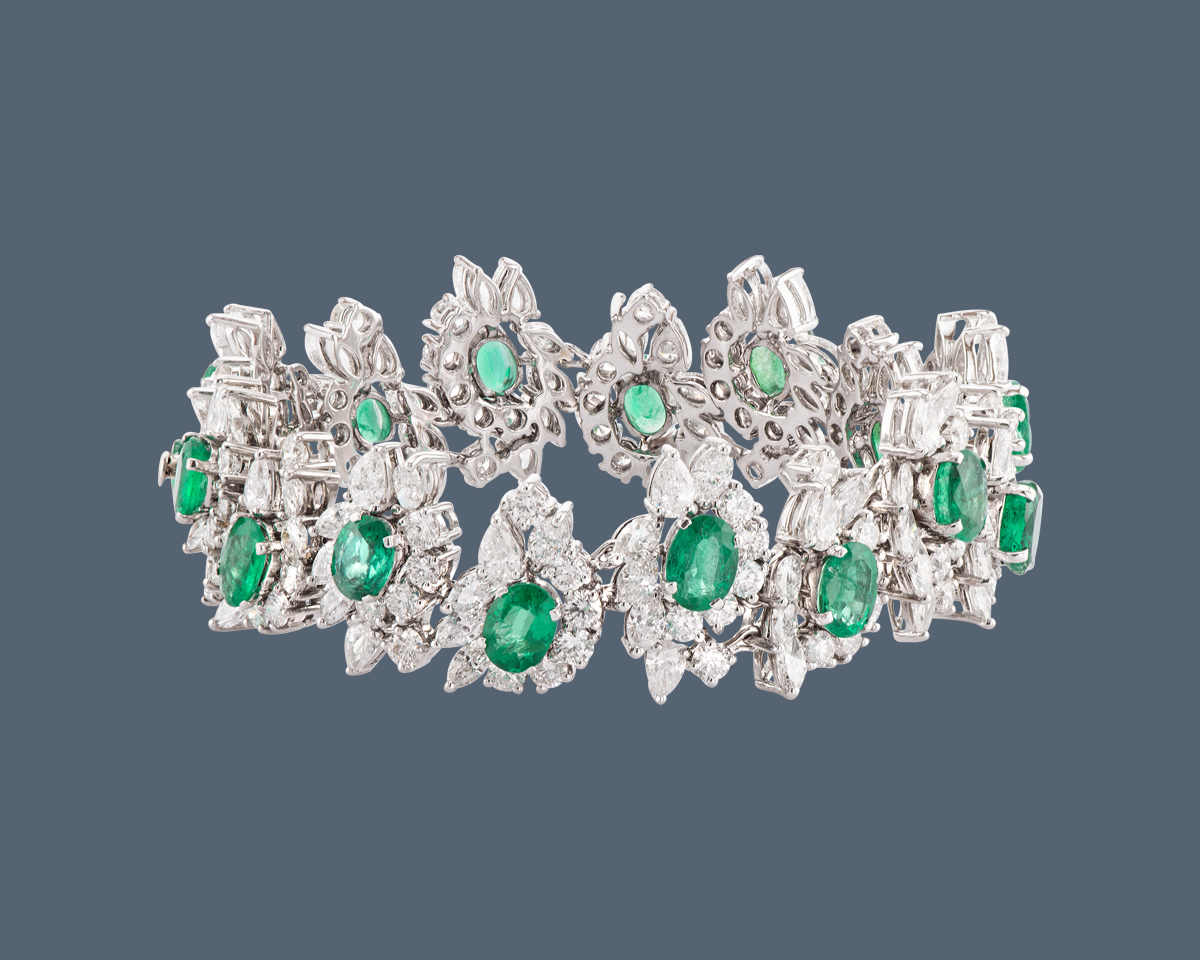 Diamond bracelet with green stones